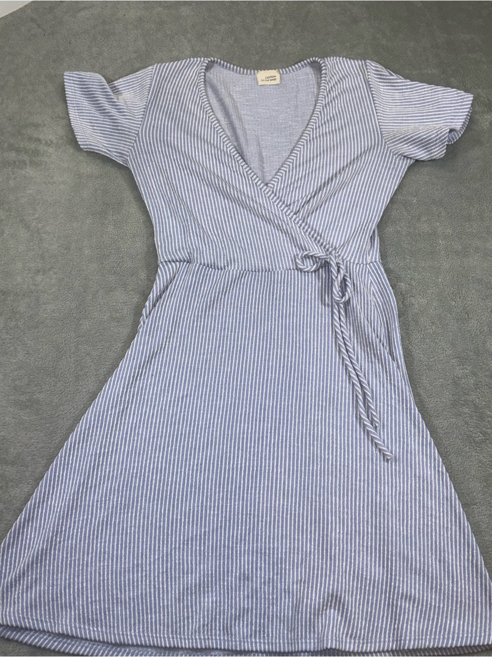 Blue and white striped faux wrap dress
